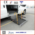 Scissor wheelchair lift for van side door